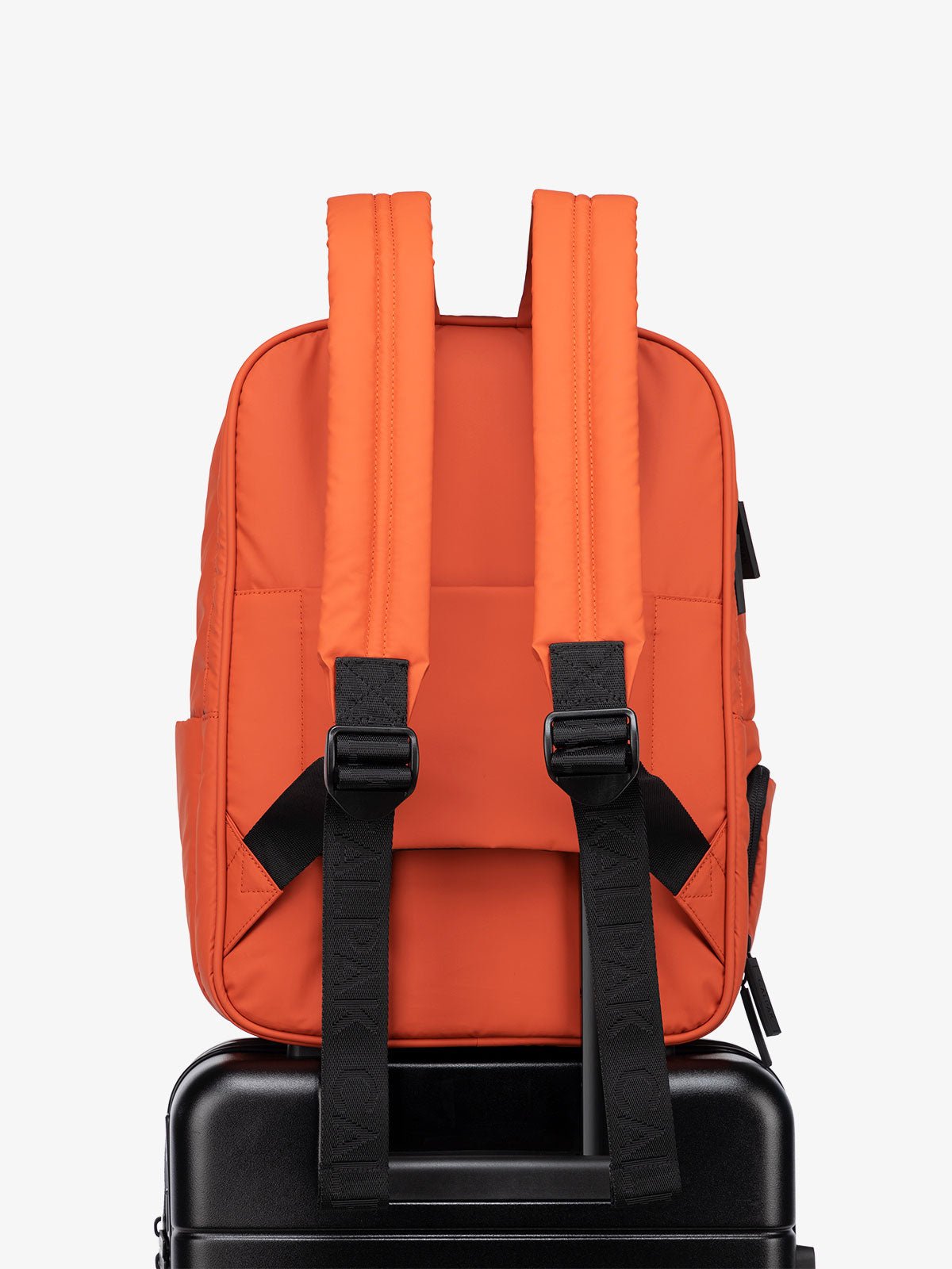 luggage backpack with trolley sleeve in red orange brick