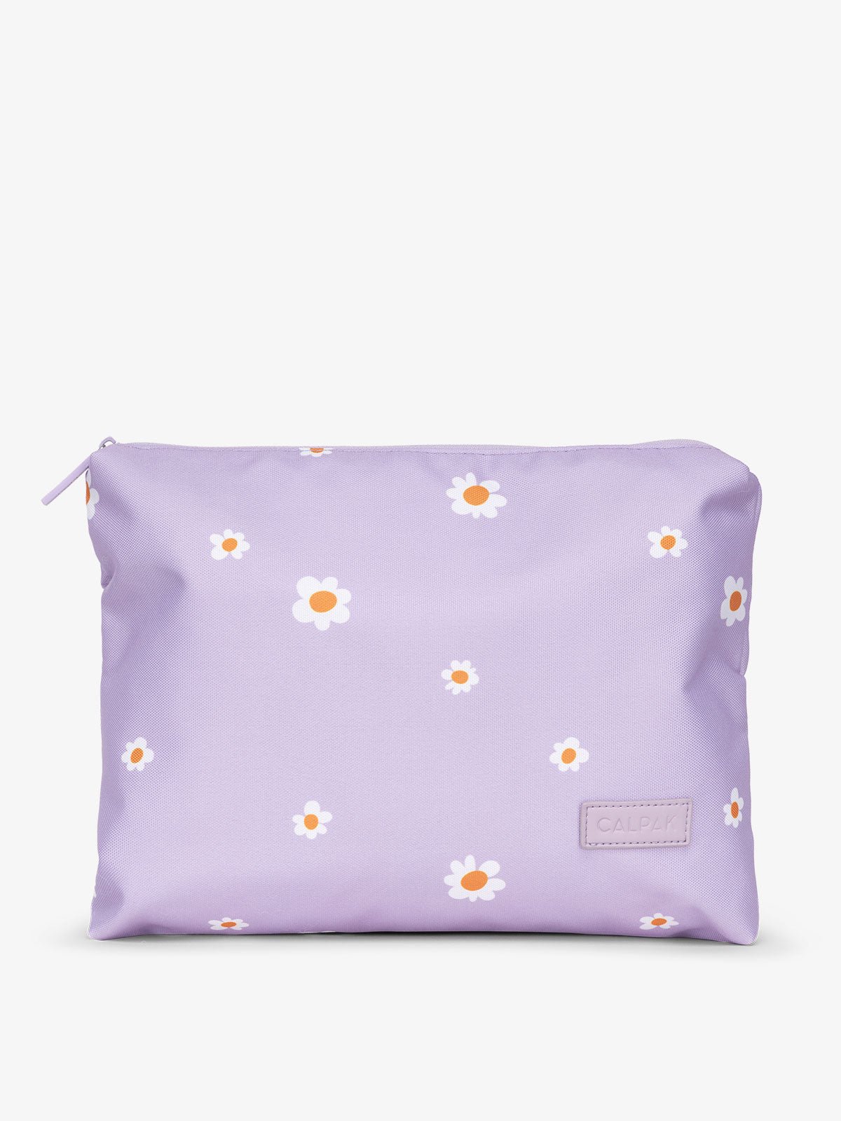 CALPAK water-resistant travel pouch for luggage in orchid fields