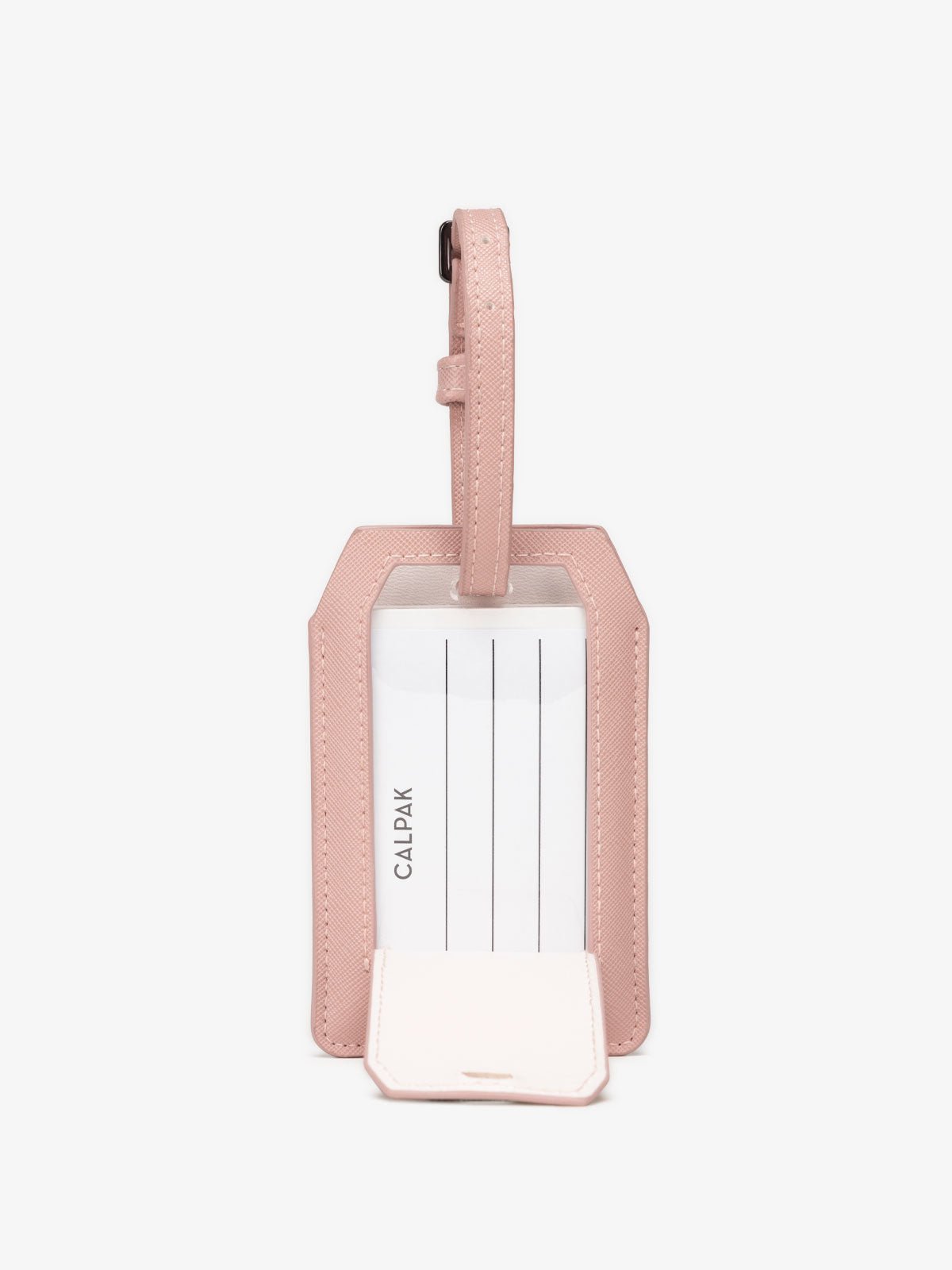 pink CALPAK luggage tag with portable travel charger