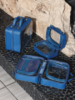 CALPAK dark blue clear makeup cases with zippered compartments in small, medium and large sizes; CCM2001-DEEP-SEA