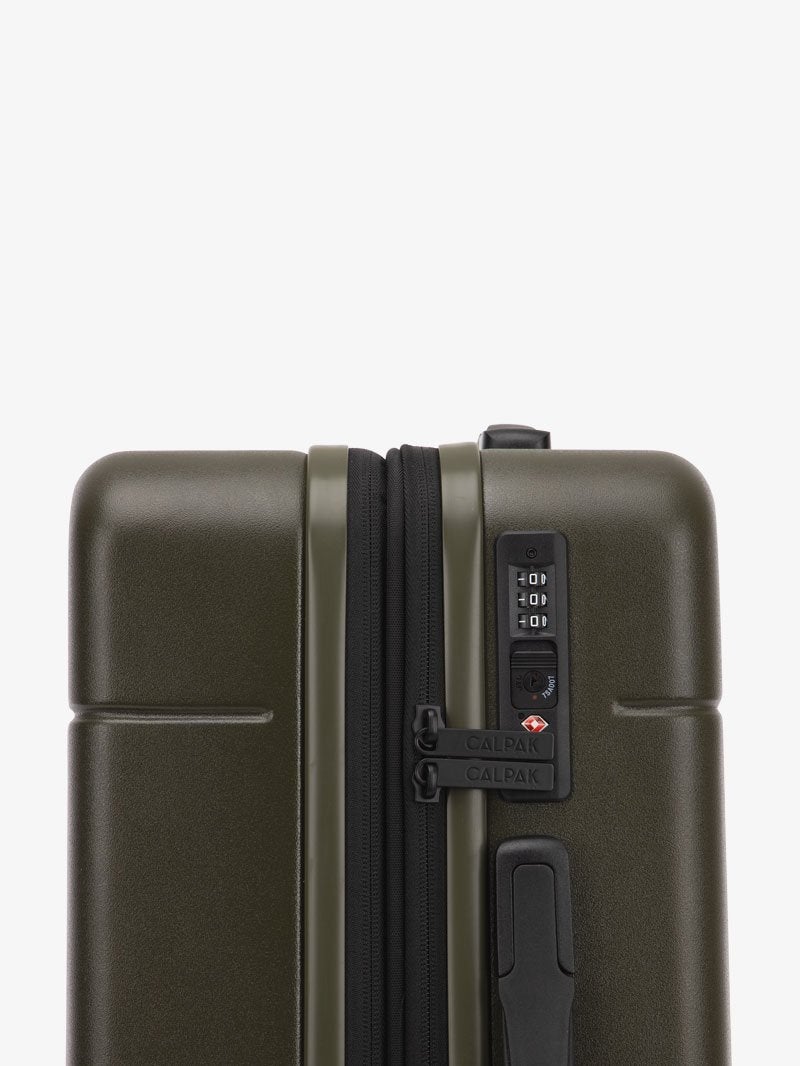 TSA lock of CALPAK Hue hard shell rolling carry-on luggage in green moss color