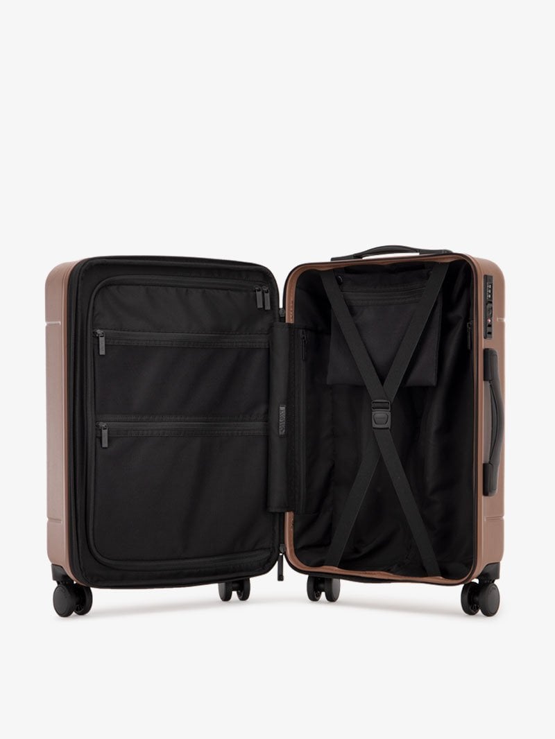brown hazel CALPAK Hue hardside carry on suitcase with laptop compartment and compression straps