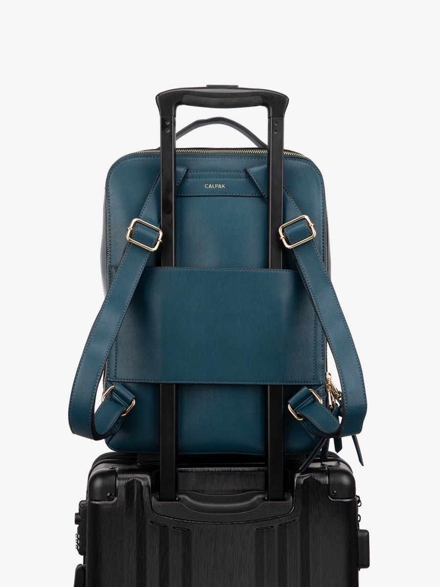 CALPAK Kaya laptop backpack for travel with luggage trolley sleeve in bermuda color