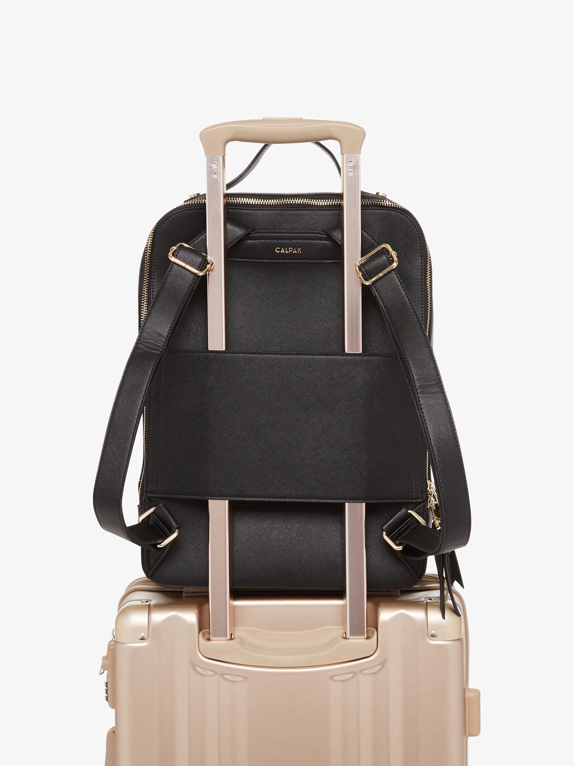black CALPAK Kaya laptop backpack with luggage trolley sleeve
