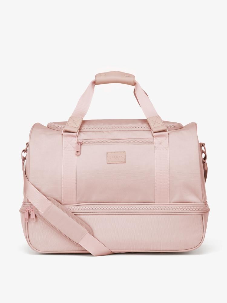CALPAK stevyn duffel in pink sand with long body strap and shoe compartment