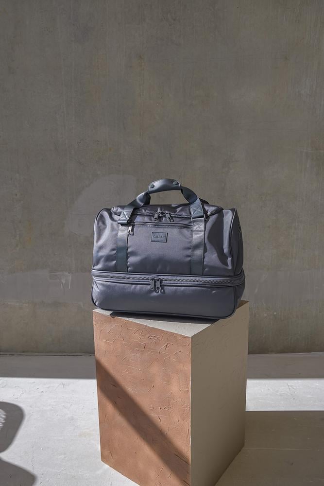 CALPAK Stevyn duffle bag with shoe compartment in grey color