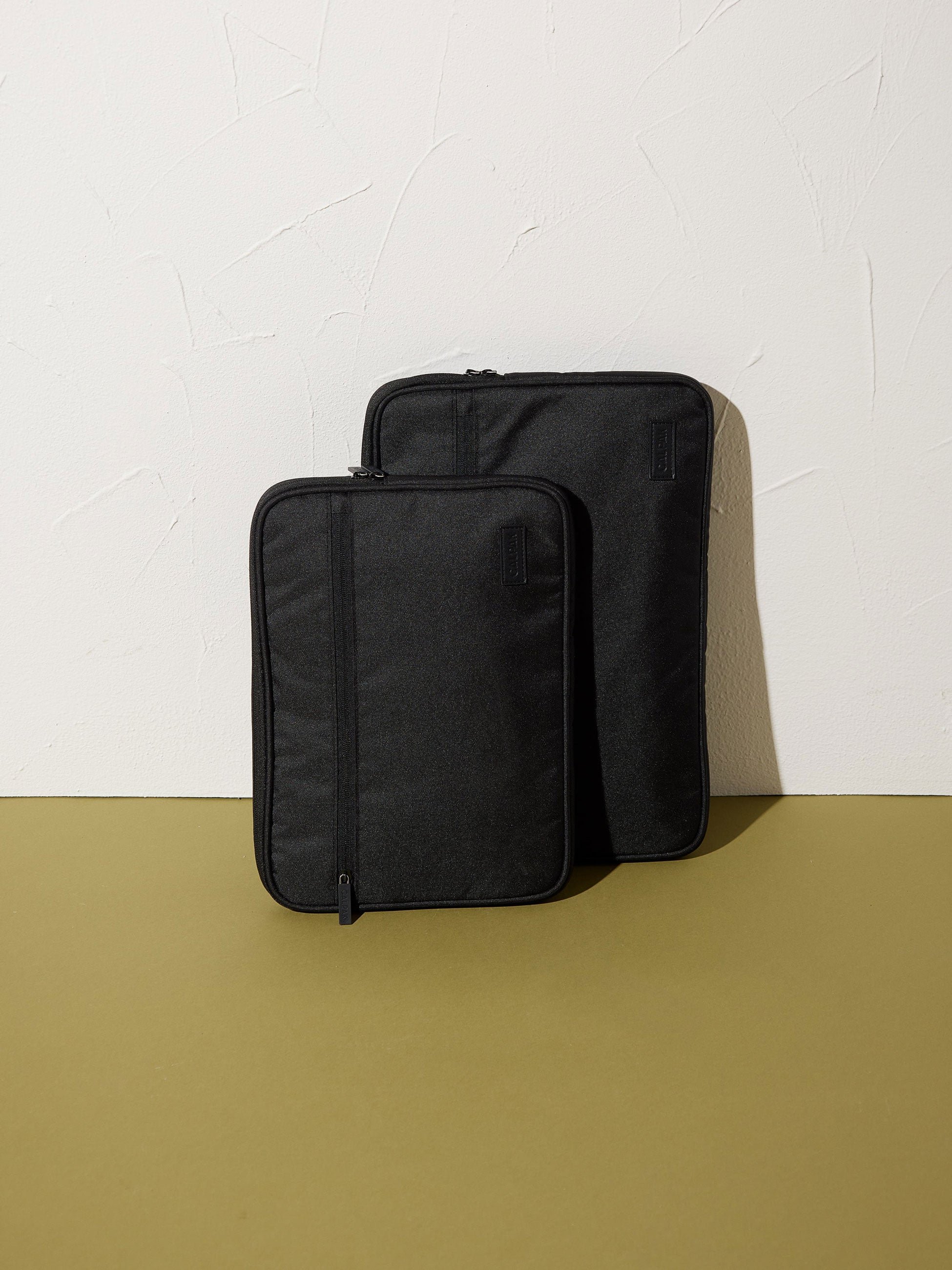 CALPAK Padded Laptop Sleeve in sizes 15-17in and 13-14in