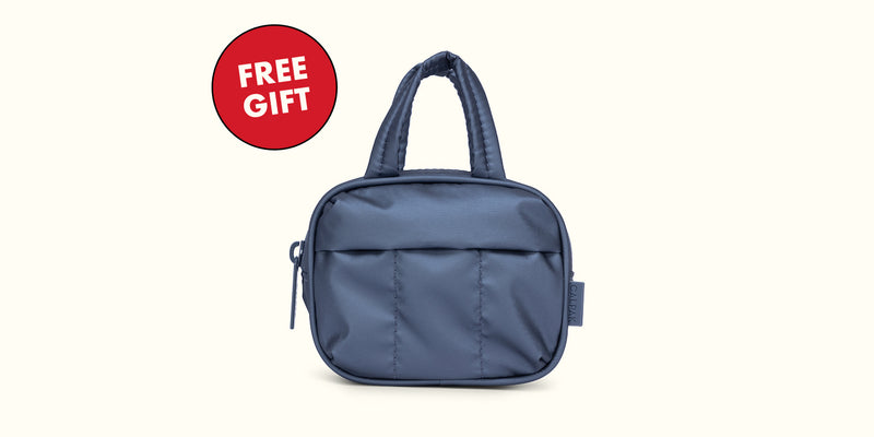 FREE Luka Duffel Bag Charm with Select Purchase