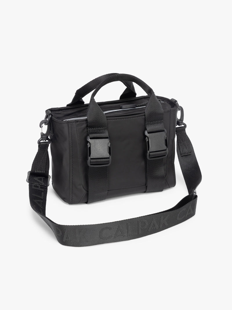 CALPAK Fit Gym Crossbody Bag in Black side view with white background