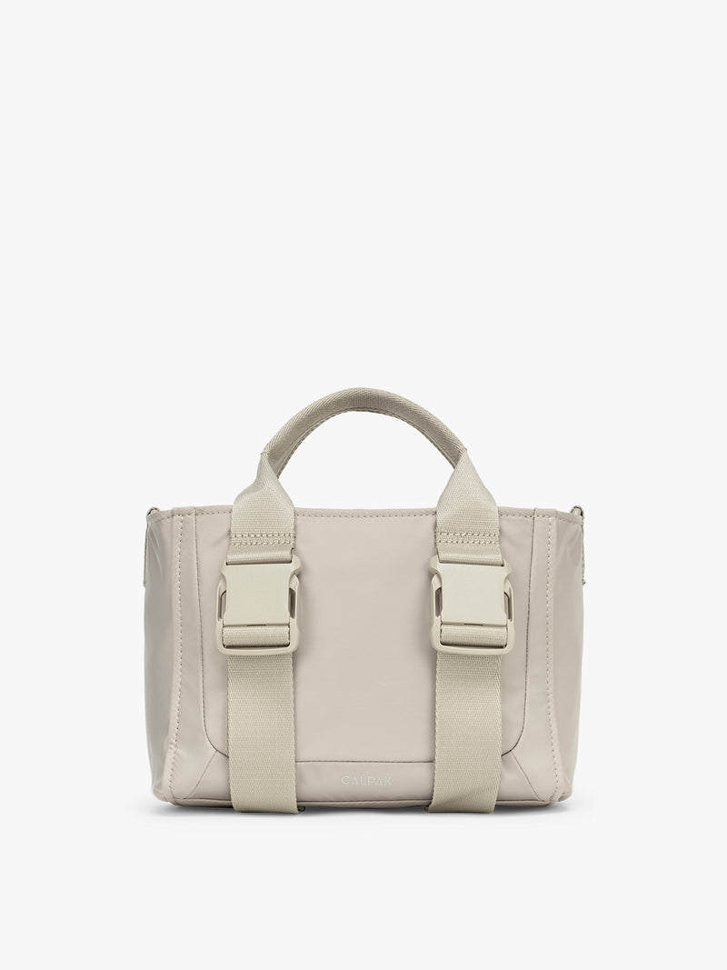 CALPAK Fit Gym Crossbody Bag in beige Greige front view with white background