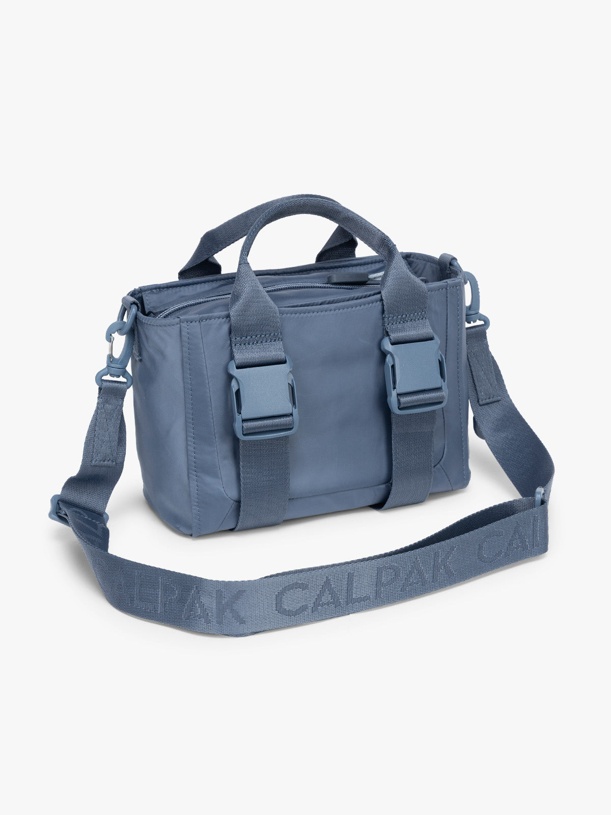 CALPAK Fit Gym Crossbody Bag in blue Indigo side view with white background; ABF2601-INDIGO
