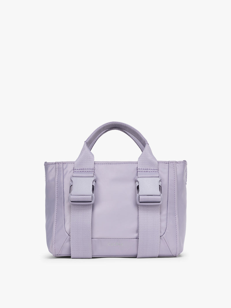 CALPAK Fit Gym Crossbody Bag in light purple Iris front view with white background