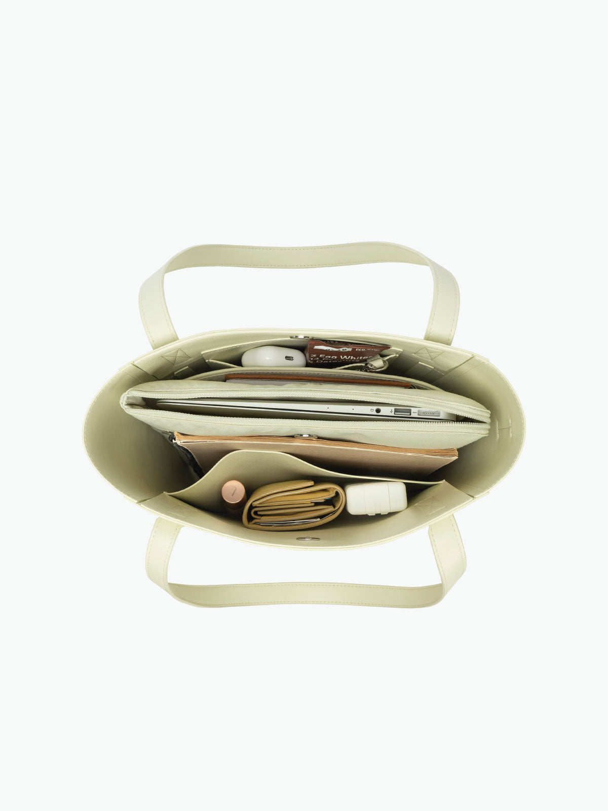 Open interior of the CALPAK Haven 14" Haven Laptop Tote in light green Celadon; ABU2501-CELADON