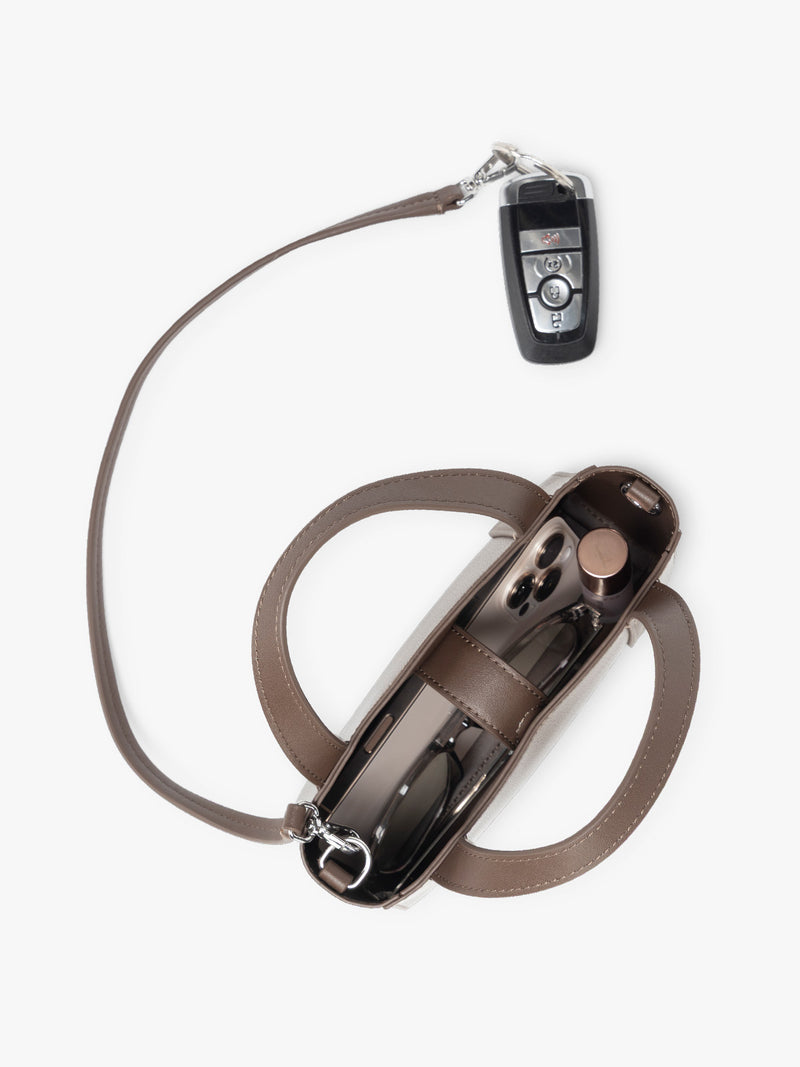 CALPAK Haven Mini Crossbody Bag in dark brown Espresso top view with detachable key strap