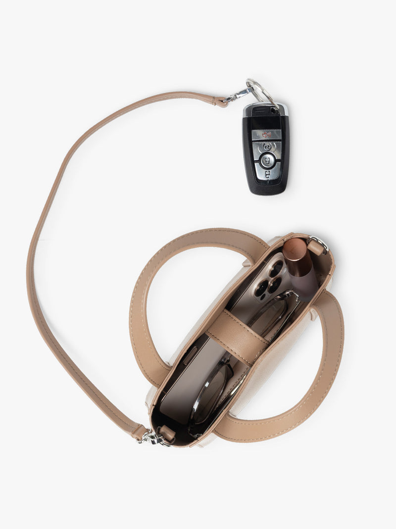 CALPAK Haven Mini Crossbody Bag in beige Taupe top view with key strap