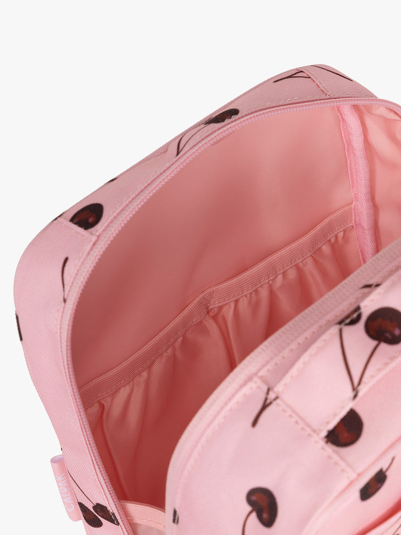 Opened view of CALPAK Everything Cube pink with cherry print Blossom Pink