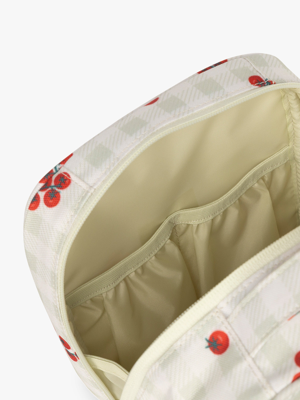 Pockets of CALPAK Everything Cube inlight and green gingham pattern with tomato print; ACE2401-CELADON-TOMATO-PICNIC