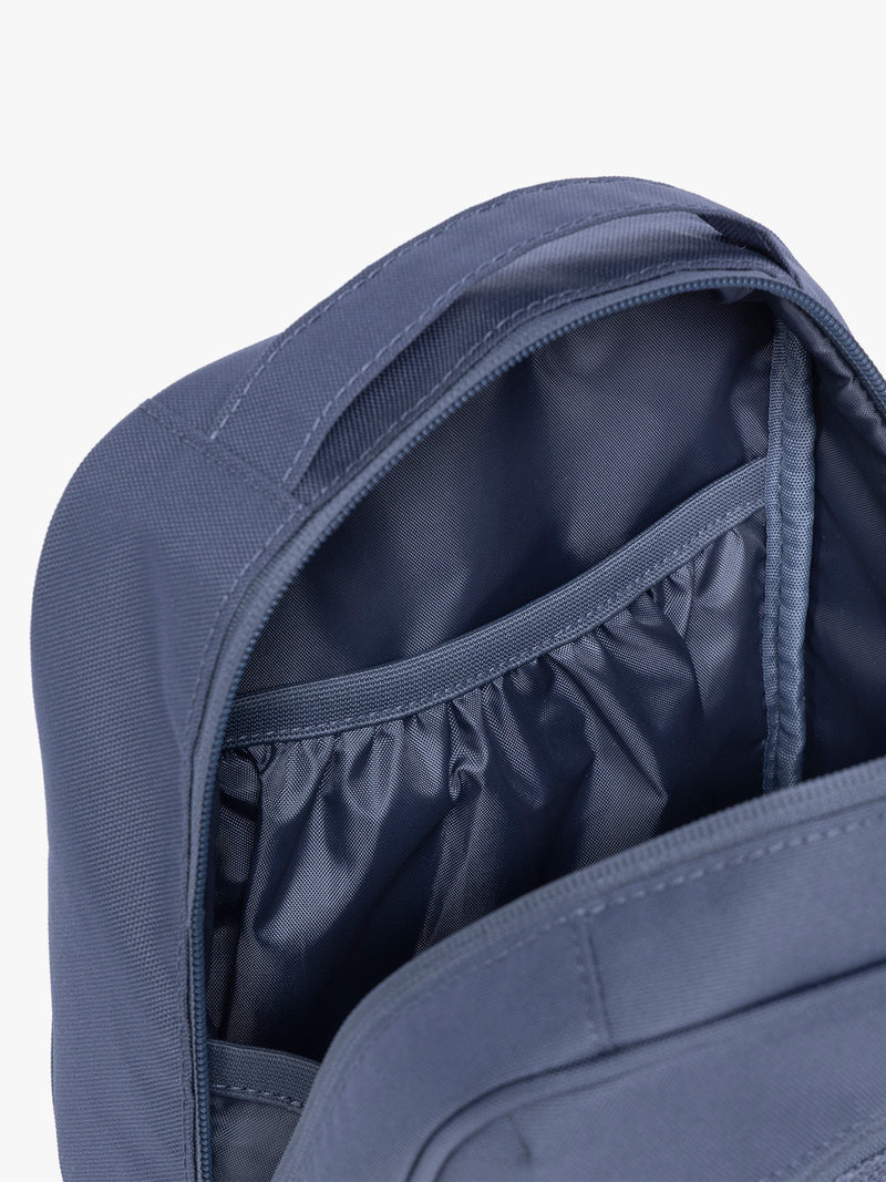 Inside pocket of CALPAK Everything Cube in dark blue Indigo