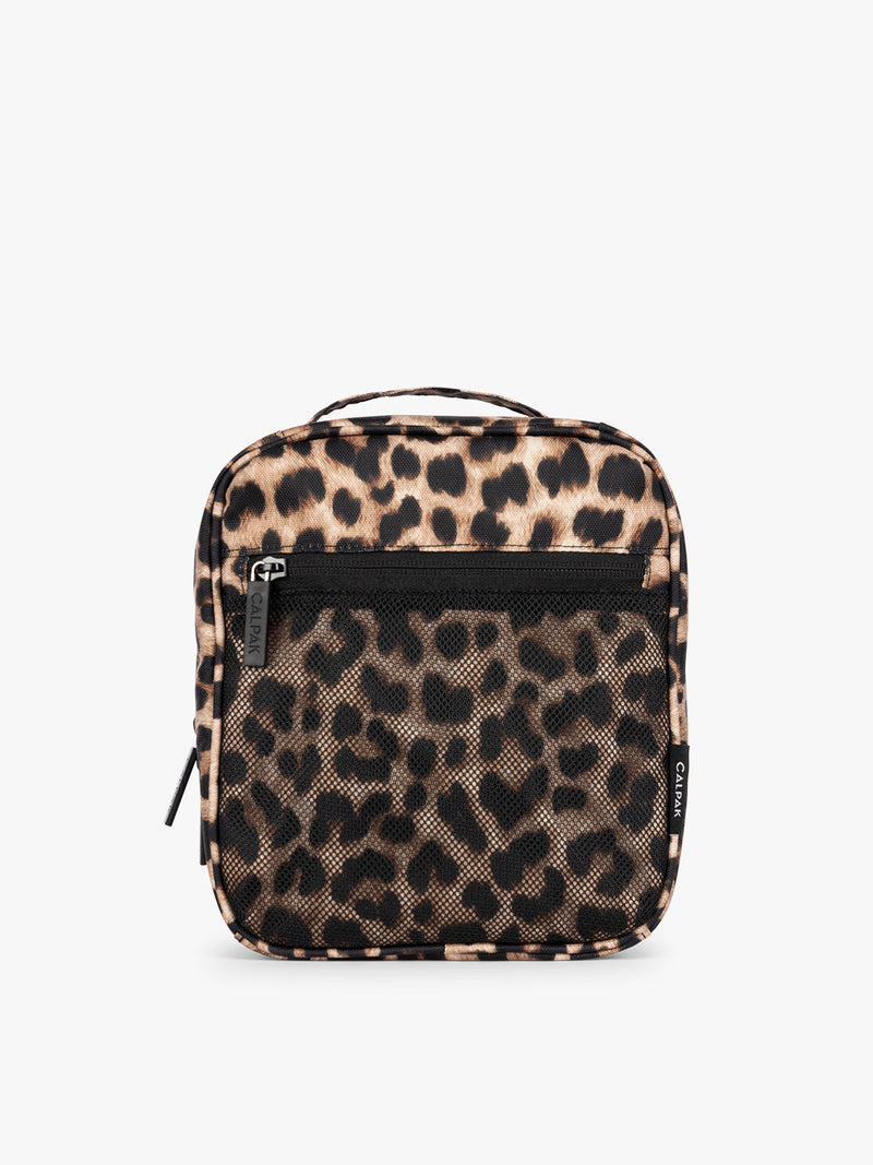Leopard print in Leopard the CALPAK Everything Cube organizer with a top handle, a front zippered pocket, and a textured mesh lower panel, shown against a plain white background