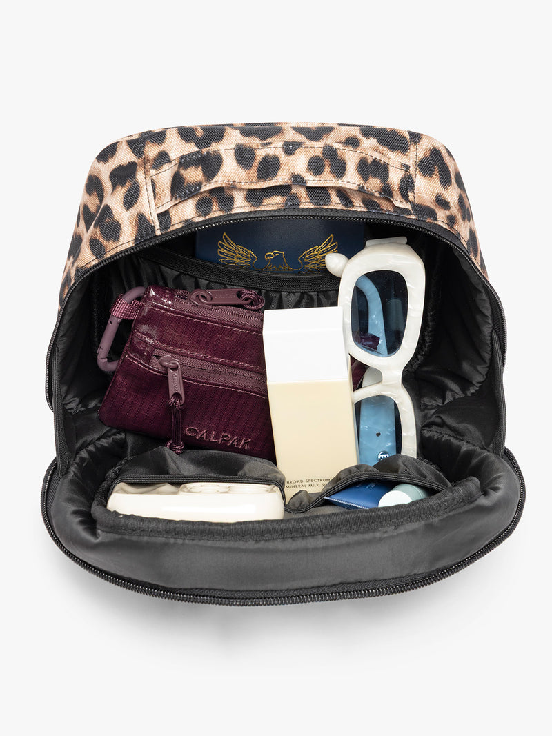Inside of the Leopard print in Leopard the CALPAK Everything Cube organizer with a top handle, a front zippered pocket, and a textured mesh lower panel, shown against a plain white background