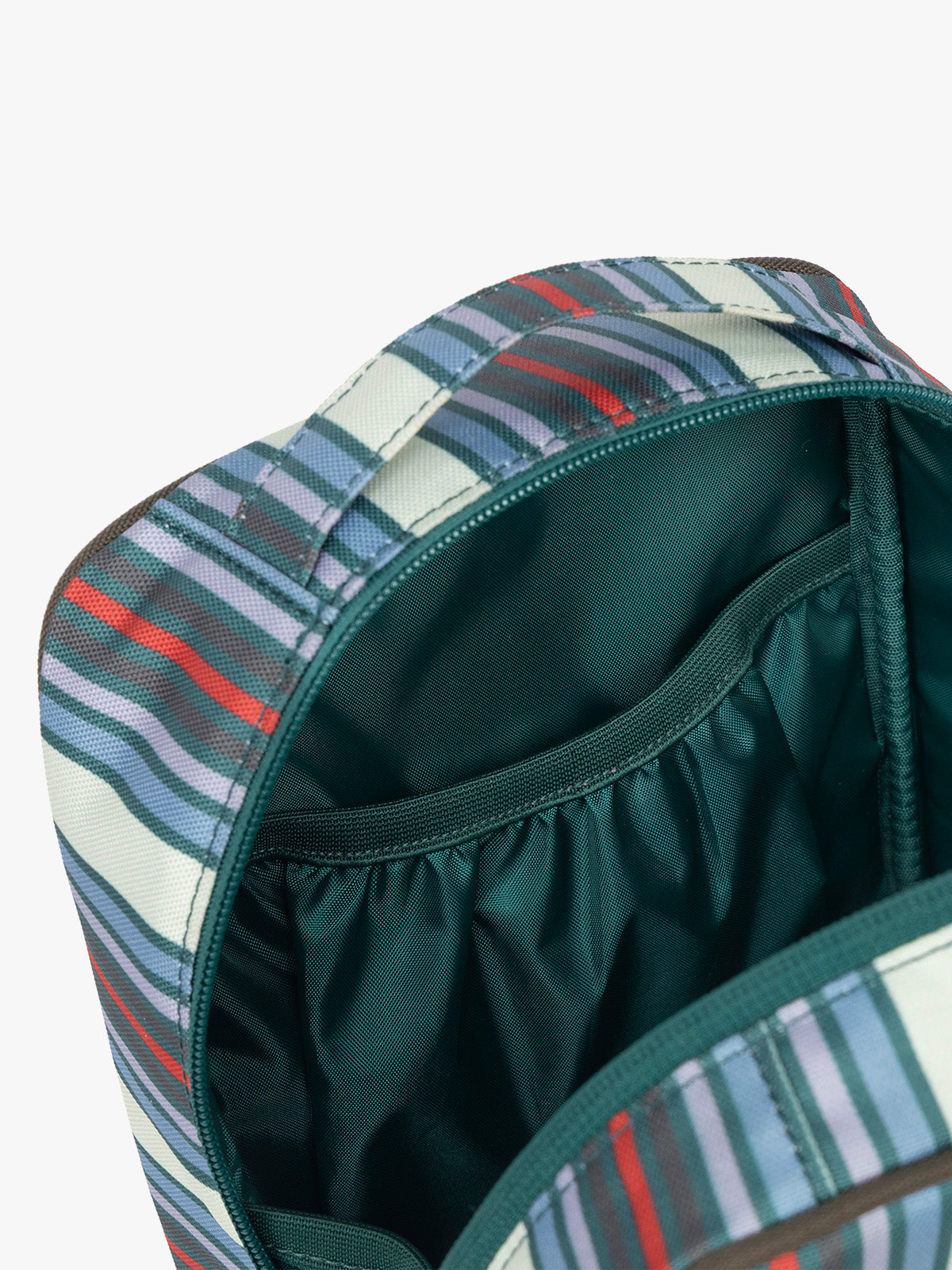 Pocket of CALPAK Everything Cube in multicolor stripe; ACE2401-RIVIERA-STRIPE