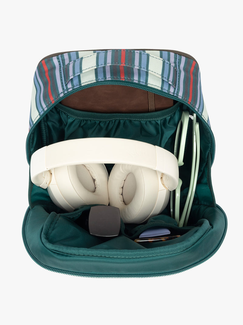 Items inside CALPAK Everything Cube in multicolor stripe