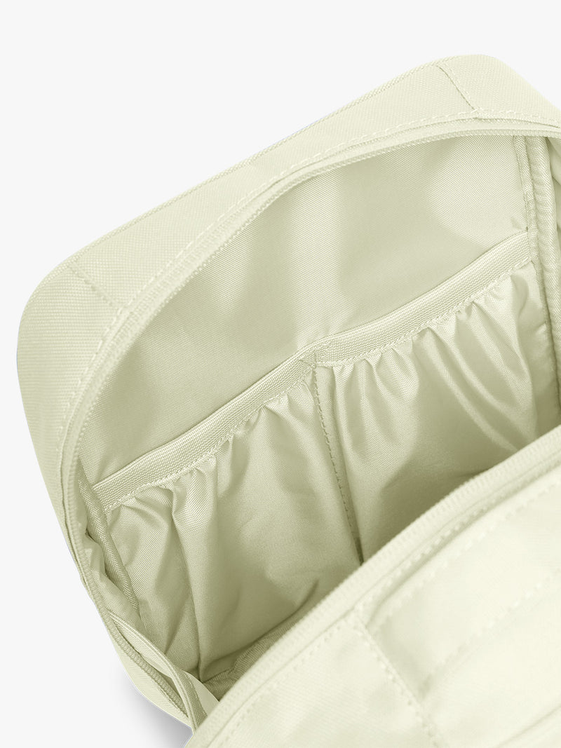 Interior pockets of CALPAK Everything Cube in light green Celadon