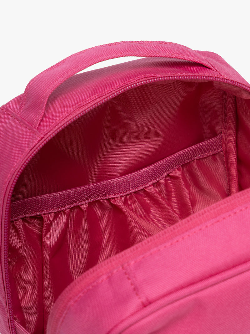 Inside of CALPAK Everything Cube in bright pink Dragonfruit