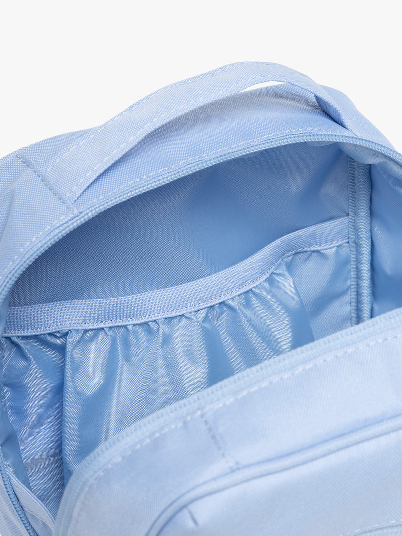Inside pocket of CALPAK Everything Cube in light blue SKY