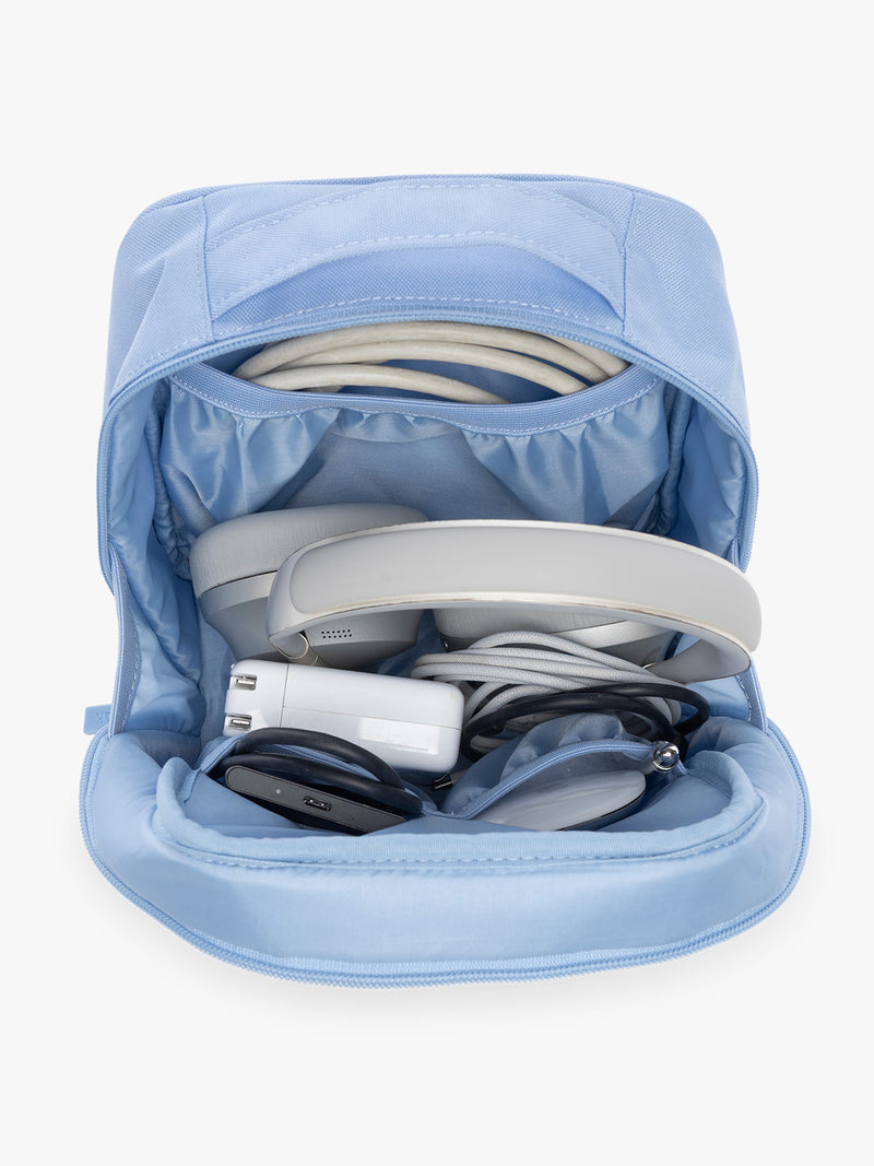 Items inside the CALPAK Everything Cube in light blue SKY