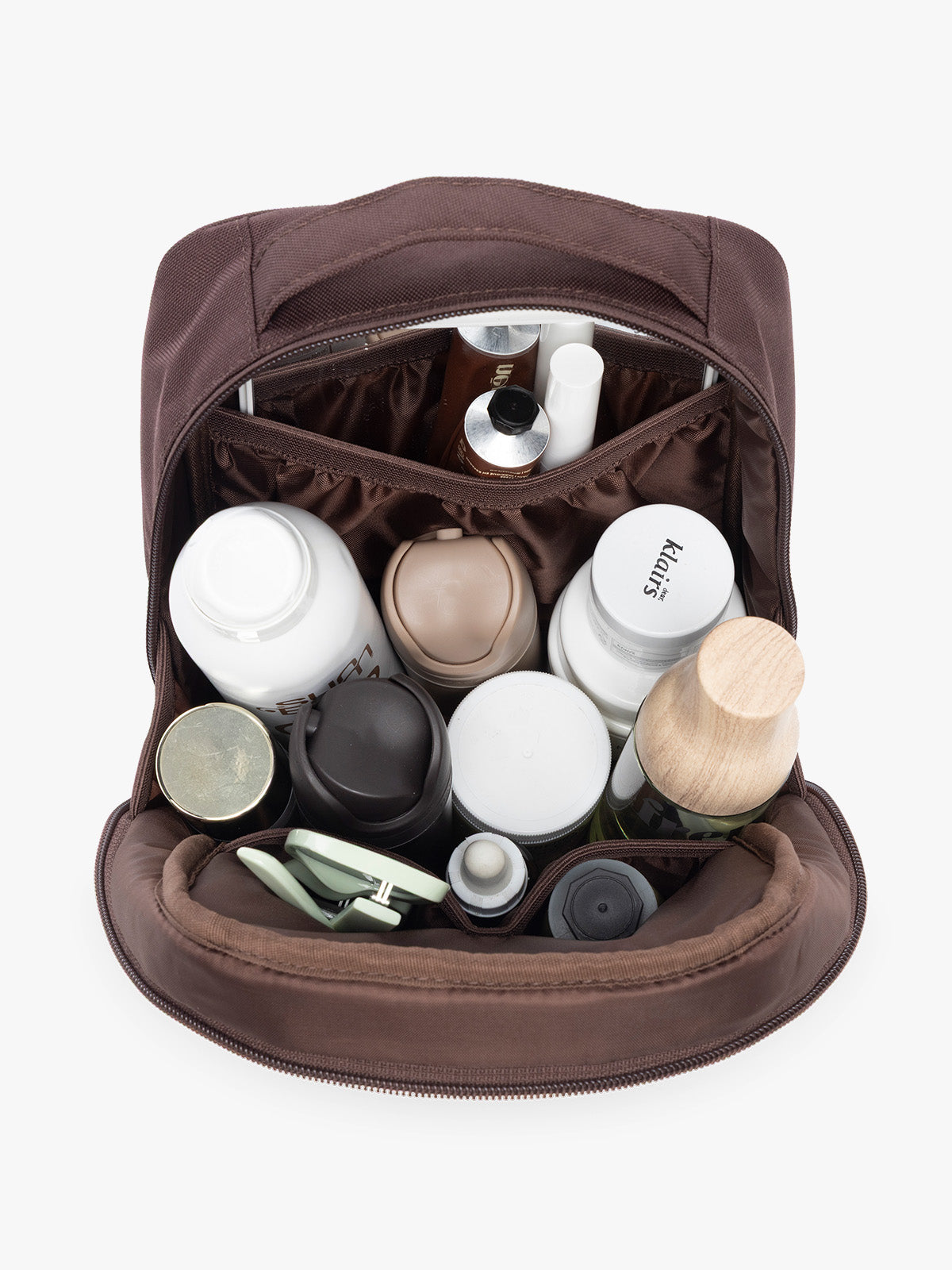 Items in the CALPAK Everything Cube in brown Walnut; ACE2401-WALNUT
