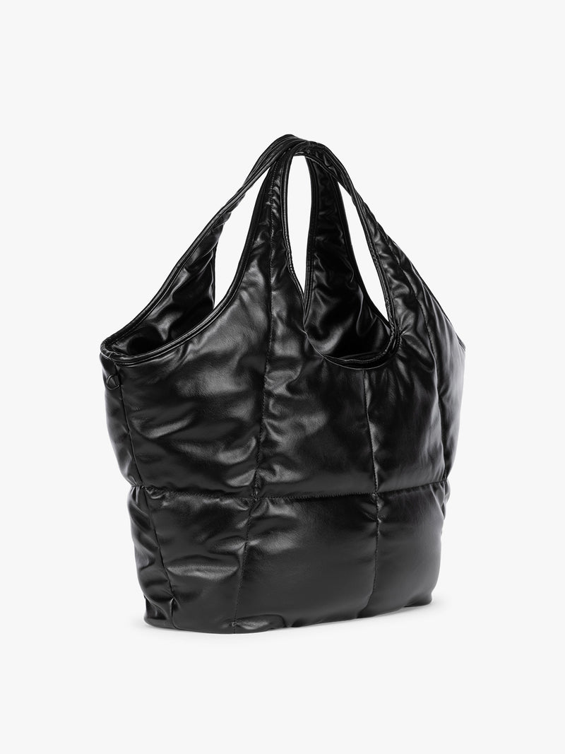 Side view of the Black quilted puffer CALPAK Luka Everything Tote Bag with a smooth finish and double shoulder straps, shown against a plain white background