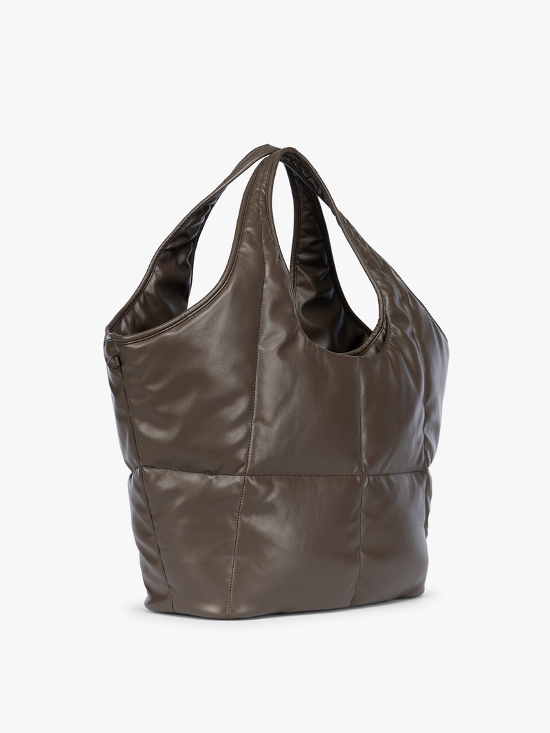 Side view of Mushroom brown quilted puffer CALPAK Luka Everything Tote Bag with a smooth finish and double shoulder straps, shown against a plain white background