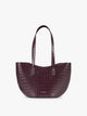 A CALPAK Haven Tulip Tote in Dark Cherry dark plum purple crocodile-embossed leather tote bag with double shoulder straps  against a plain white background ; AHP2601-DARK-CHERRY-FAUX-CROC