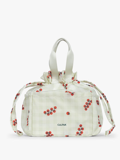 CALPAK Insulated Lunch Bag in light green Celadon and white gingham print with red tomato pattern; ALB2001-CELADON-TOMATO-PICNIC view 1