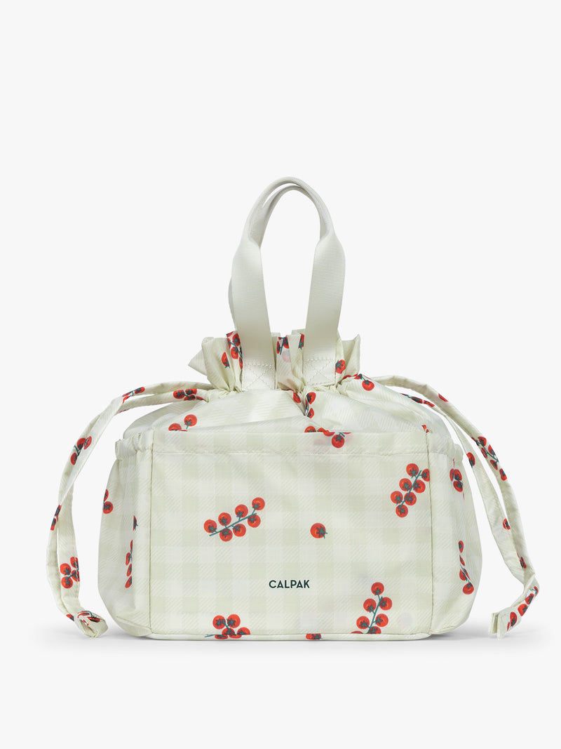 CALPAK Insulated Lunch Bag in light green Celadon and white gingham print with red tomato pattern