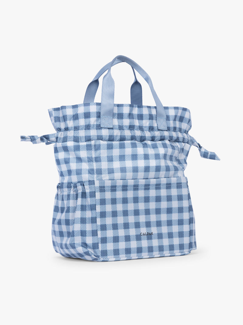 Drawstring of CALPAK Insulated Lunch Bag in light blue checkered in French Blue Gingham