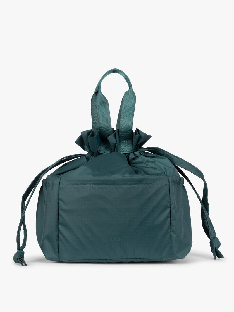 Dark teal green Kale CALPAK Insulated Lunch Bag with top handles, shown against a plain white background