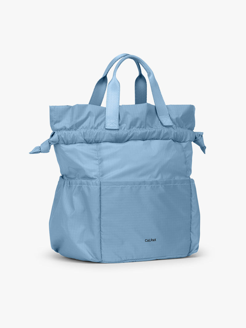Opened CALPAK Insulated Lunch Bag in blue French Blue