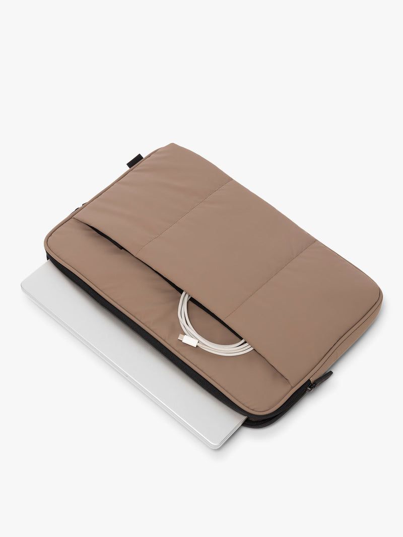 CALPAK Luka Padded Laptop Sleeve in brown Chocolate with puffy exterior with laptop and charger