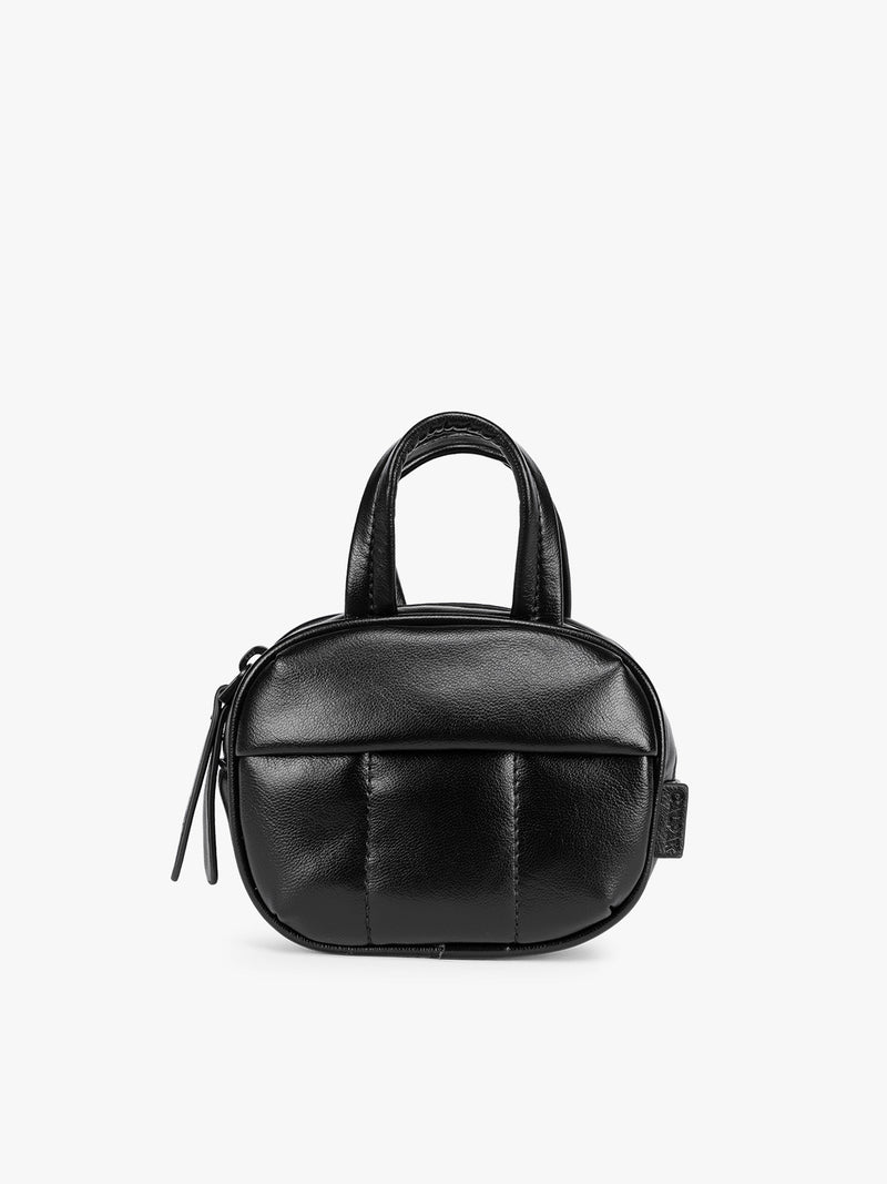 A Black Mushroom vegan leather top-handle CALPAK Luka Zip Bag Charm with a zippered front pocket and a small side strap, shown against a plain white background