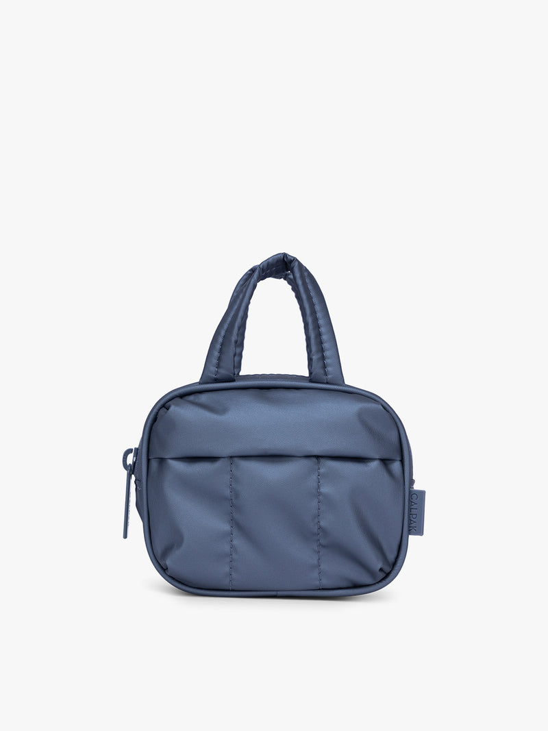 CALPAK Luka Duffel Zip Bag Charm in dark blue metallic material in Metallic Indigo