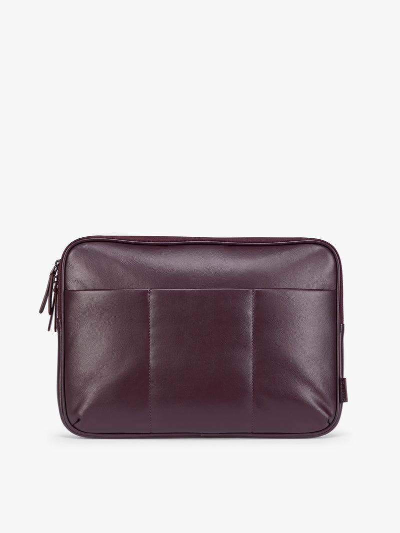 Deep burgundy Dark Cherry vegan leather CALPAK Luka 14in Laptop Sleeve with a zippered top and a front pocket, shown against a plain white background