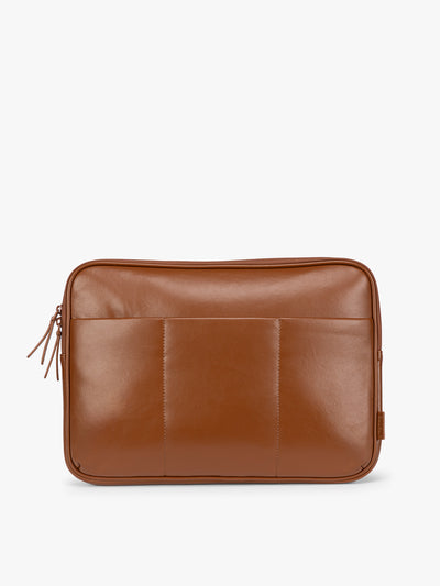 Light Honey Brown vegan leather CALPAK Luka 14in Laptop Sleeve with a zippered top and a front pocket, shown against a plain white background; ALL2401-HONEY-BROWN-PU view 1