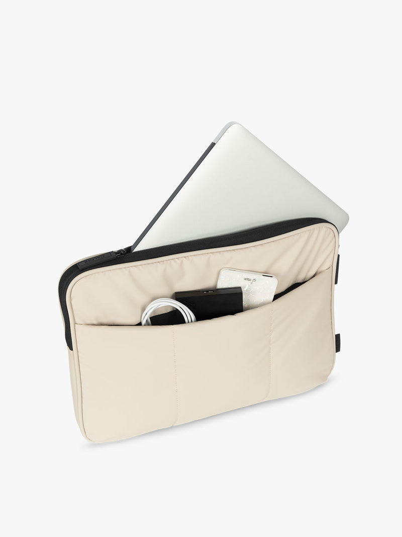 CALPAK Luka 14" Padded Laptop Sleeve with multiple exterior pockets for cords and electronics and main pocket for 14" laptop in beige oatmeal