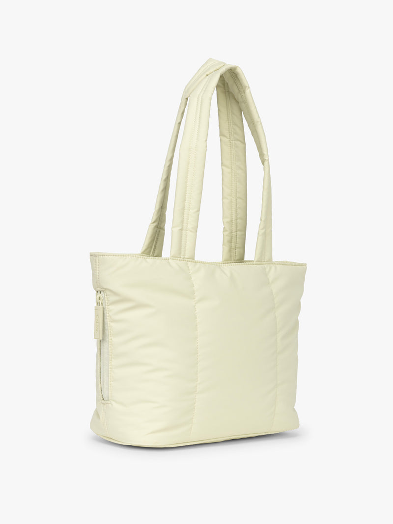 Side view of CALPAK Luka Mini Tote in light green Celadon