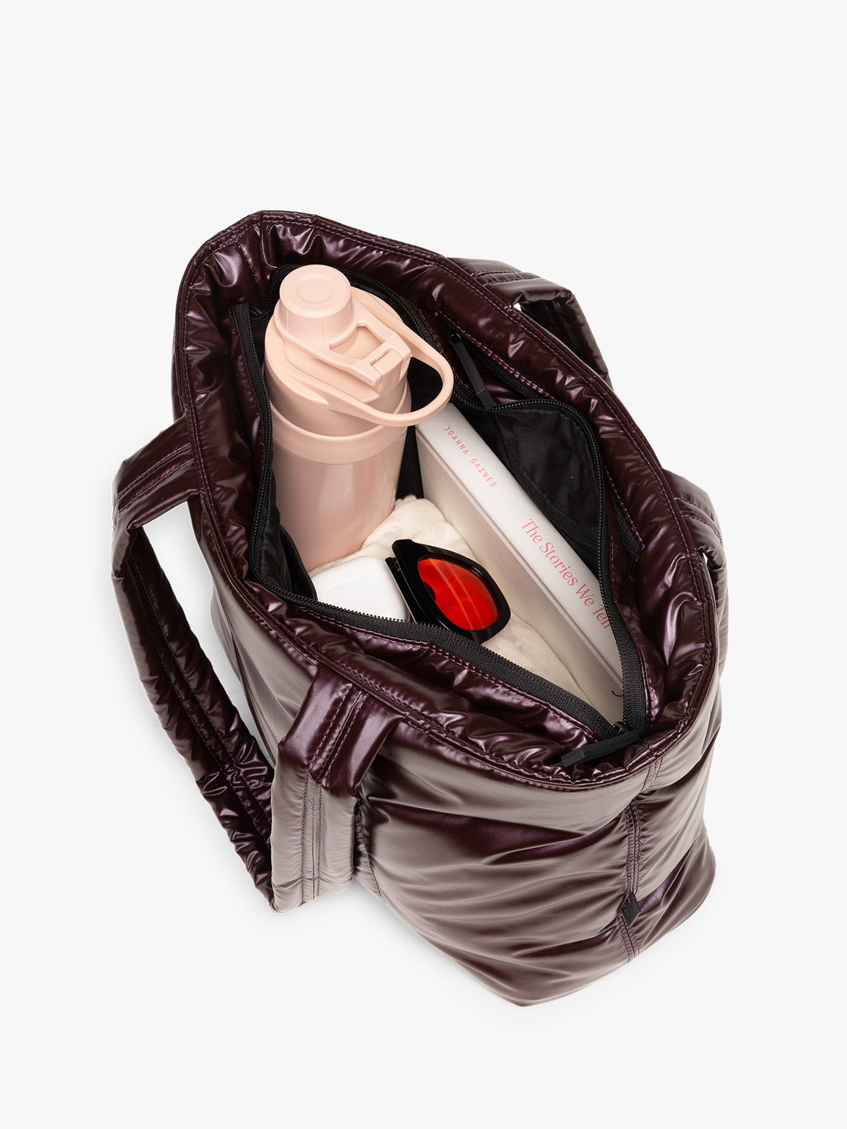 Opened view of CALPAK Luka Mini Tote in shiny maroon Glazed Dark Cherry on a white background; ALM2401-GLAZED-DARK-CHERRY