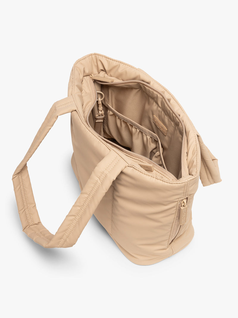 Opened view of CALPAK Luka Mini Tote in beige Latte on a white background