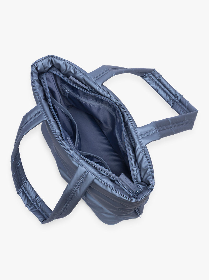 Opened view of CALPAK Luka Mini Tote in metallic dark blue material in Metallic Indigo