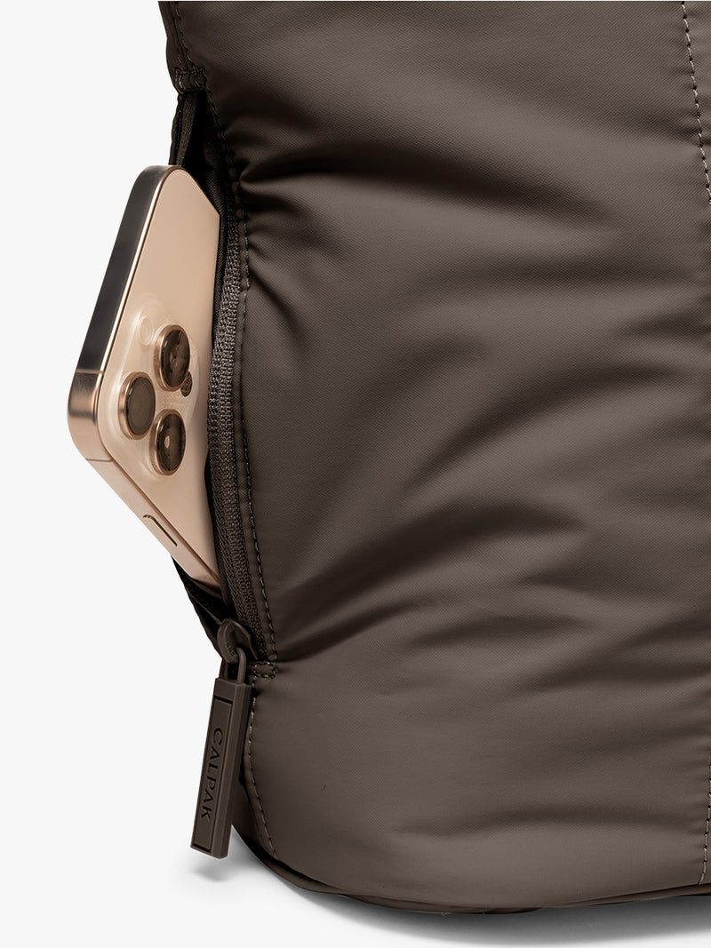 Side phone compartment of CALPAK Luka Mini Tote in brown Mushroom